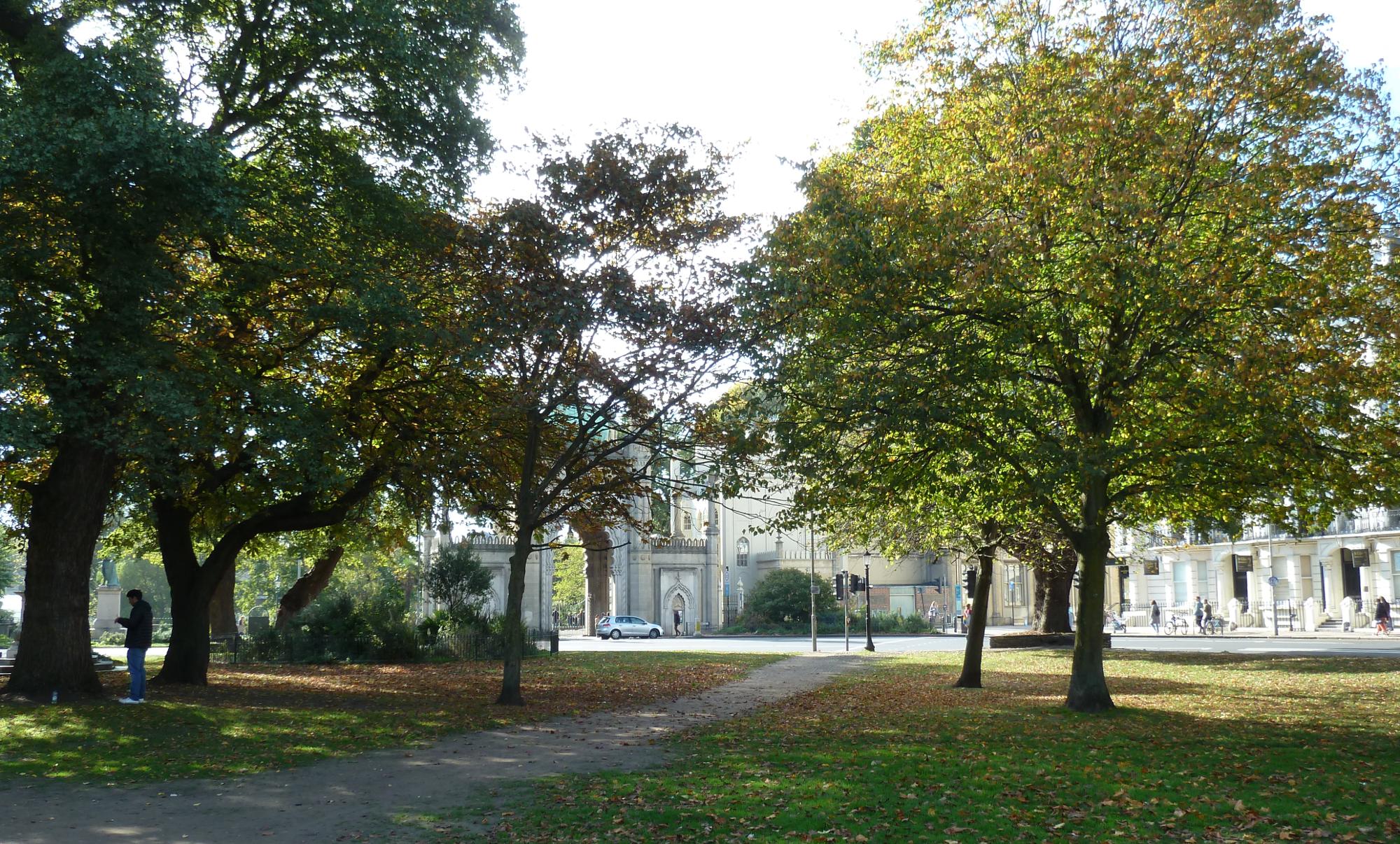 another park with palacey buildiung behind