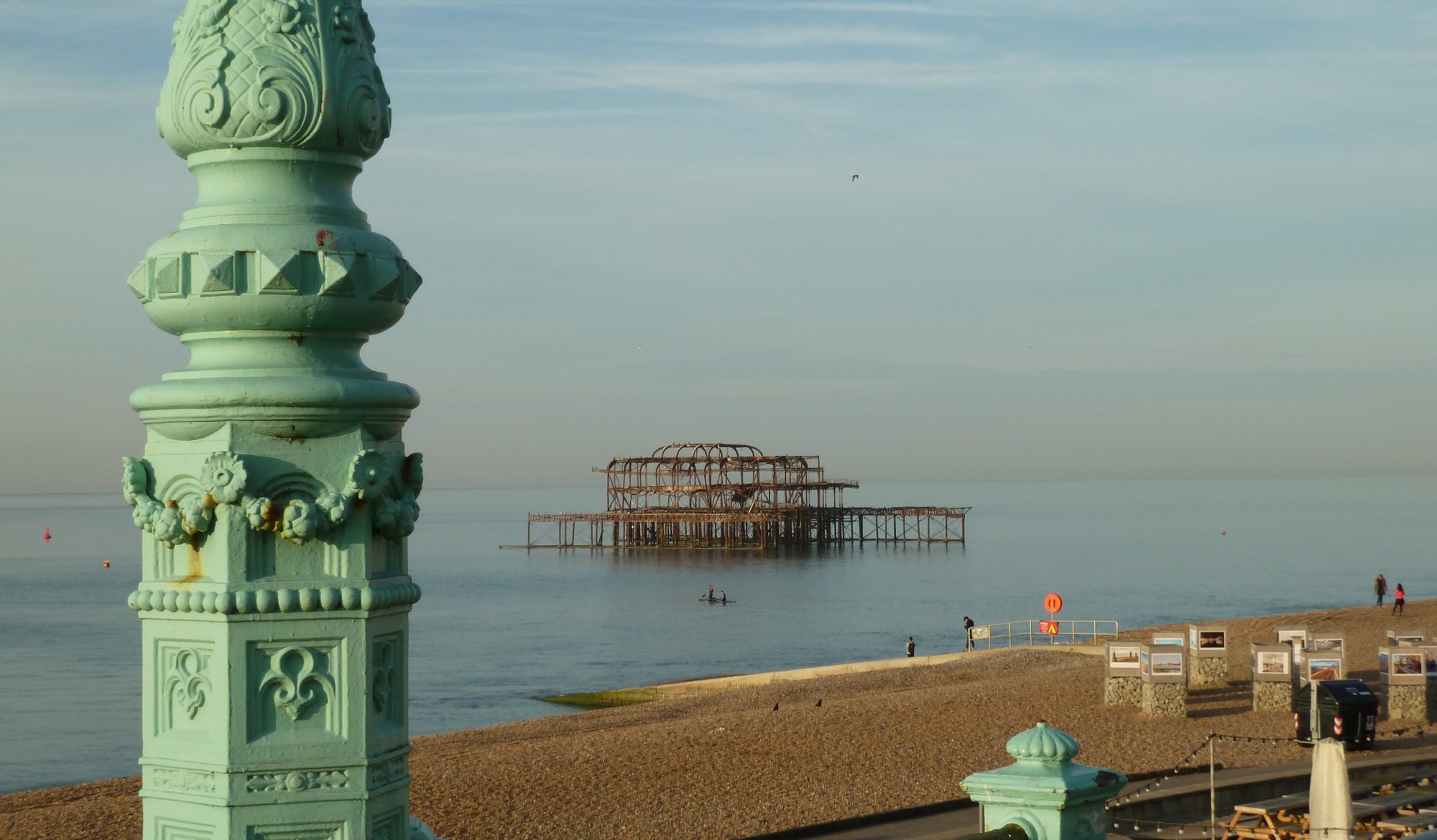 burnt out pier, green pillar